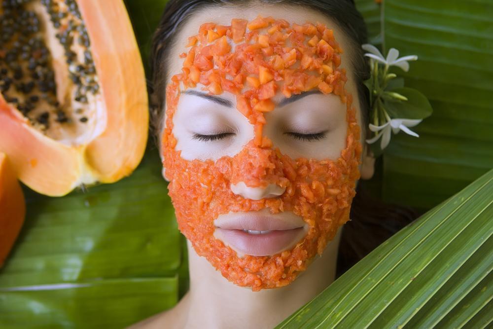 woman wearing papaya face mask