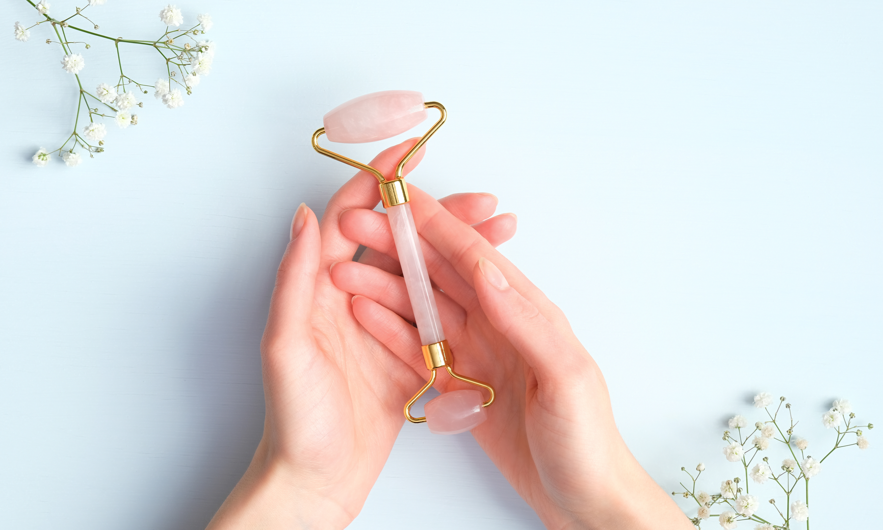 Pink quartz face roller